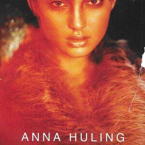 Anna Huling double-breasted, pinstriped, linen overcoat.